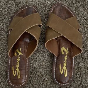 Brown sandals with tan suede straps. Foam soles